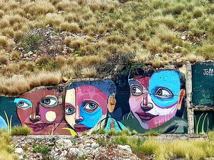 African Mural Painted On Exposed Rock Face Opposite Bridge Street Brewery Along The Baakens River | Port Elizabeth | Gqeberha | Eastern Cape | South Africa | Australian Cricket Tours