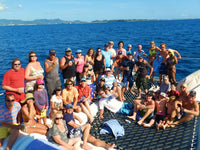 Australian Cricket Tours - Tour Group Photo On The Bow Net Of The Catamaran After An All-Inclusive Day Trip To Prickly Pear, Anguilla, West Indies